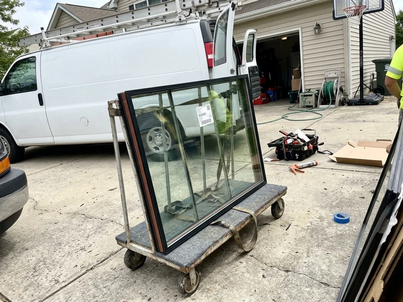 New insulated glass unit with warm-edge spacer on an A-frame cart before install