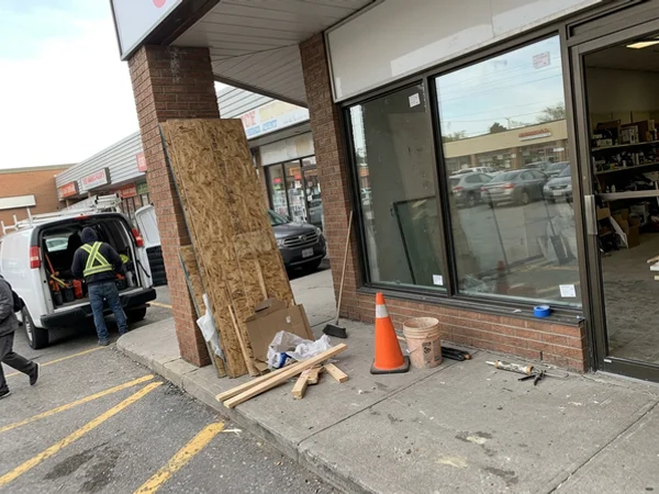 Agincourt plaza storefront with two new tempered lites