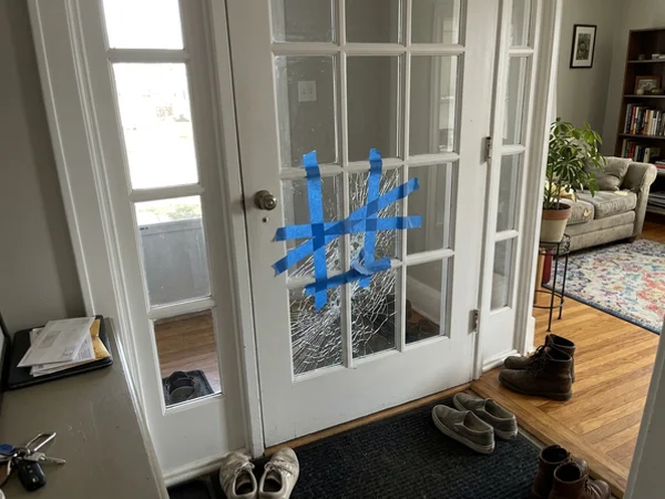 Cracked French door lite in Guildwood before re-glazing