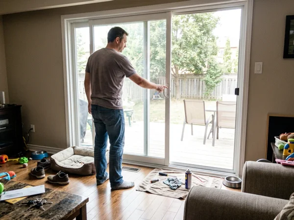 Repaired patio door sliding open easily in a Bronte home