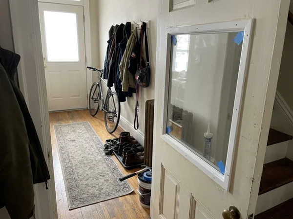 New tempered lite in a painted wood stile-and-rail door in Roncesvalles