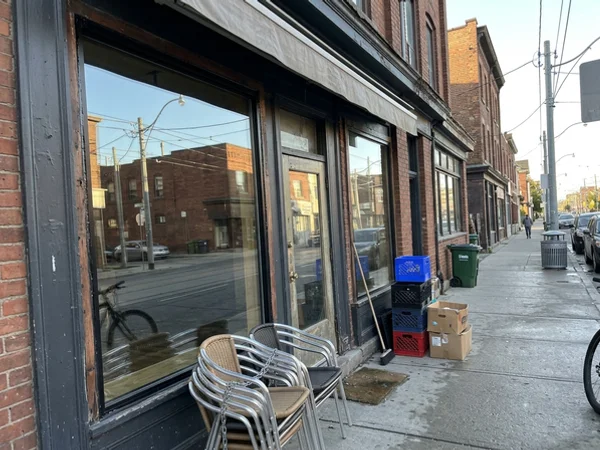Repaired restaurant storefront glass wall early in the morning